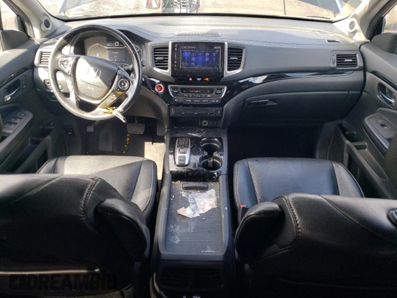 2017 Honda Pilot Touring with VIN 5FNYF6H90HB028112, listed as a Copart auction lot 52197645 with 218,944 mi miles and Salvage Title. Bid and sale history available at DreamBid. Image 8.
