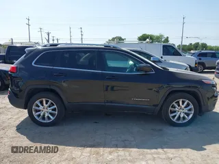 2014 Jeep Cherokee Limited with VIN 1C4PJMDS5EW242544, listed as a IAAI auction lot 42213907 with 114,515 mi miles and . Bid and sale history available at DreamBid. Image 13.