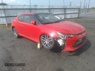 2015 Scion tC z VIN JTKJF5C70FJ003923, wystawiony jako IAAI lot #42287239 z przebiegiem 190 266 mil mil oraz . Historia ofert i sprzedaży dostępna na DreamBid. Obrazek 1.