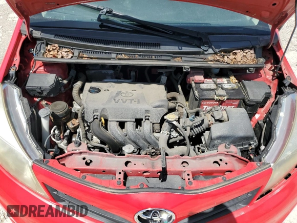 2012 Toyota Yaris L z VIN JTDJTUD36CD518179, wystawiony jako Copart lot #54722225 z przebiegiem 80 122 mil mil oraz Szkoda całkowita • Salvage title. Historia ofert i sprzedaży dostępna na DreamBid. Obrazek 11.