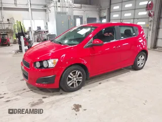 2014 Chevrolet Sonic LT with VIN 1G1JC6SB1E4125174, listed as a IAAI auction lot 41521991 with 125,490 mi miles. Bid and sale history available at carsss.com. Image 2.