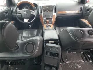 2010 Cadillac STS AWD z VIN 1G6DU6EV3A0131148, wystawiony jako Copart lot #44047375 z przebiegiem 147 556 mil mil oraz Szkoda całkowita • Salvage title. Historia ofert i sprzedaży dostępna na DreamBid. Obrazek 8.