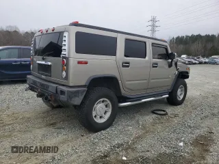 2004 Hummer H2 with VIN 5GRGN23U24H118230, listed as a Copart auction lot 87764075 with 202,206 mi miles and Salvage Title. Bid and sale history available at carsss.com. Image 3.