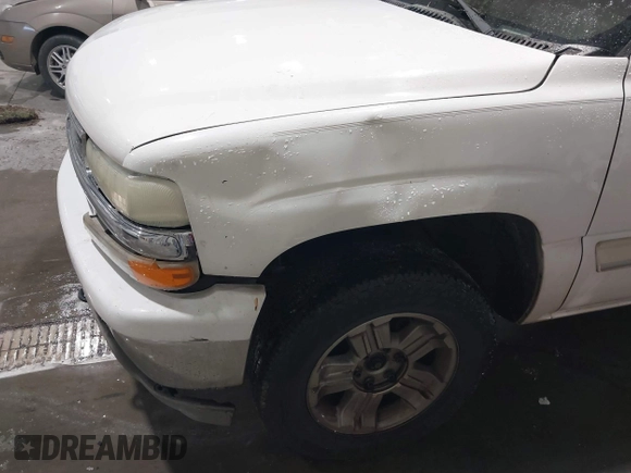 2005 Chevrolet Tahoe Z71 z VIN 1GNEK13TX5R139378, wystawiony jako IAAI lot #41267070 z przebiegiem 229 243 mil mil oraz . Historia ofert i sprzedaży dostępna na DreamBid. Obrazek 6.