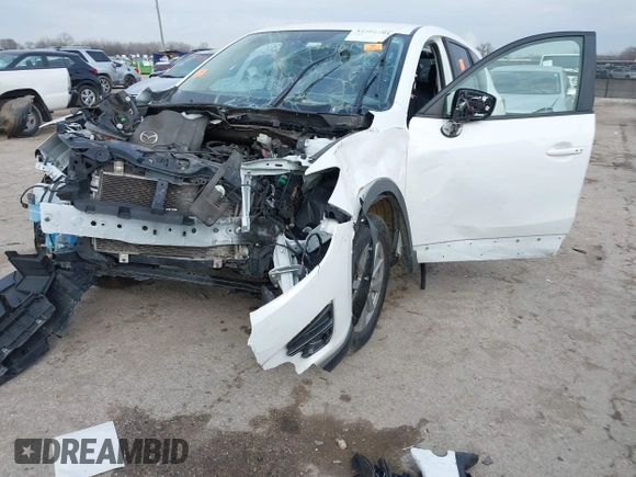 2016 Mazda CX-5 Touring with VIN JM3KE2CY1G0888850, listed as a IAAI auction lot 41562701 with 1 mi miles. Bid and sale history available at carsss.com. Image 6.