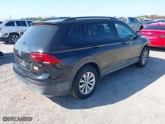 2018 Volkswagen Tiguan S with VIN 3VV1B7AX6JM036407, listed as a IAAI auction lot 41705021 with 84,171 mi miles. Bid and sale history available at carsss.com. Image 4.
