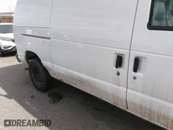2010 Ford Econoline Cargo Commercial with VIN 1FTNE2EW0ADA98103, listed as a IAAI auction lot 41735290 with 143,717 mi miles and . Bid and sale history available at DreamBid. Image 6.