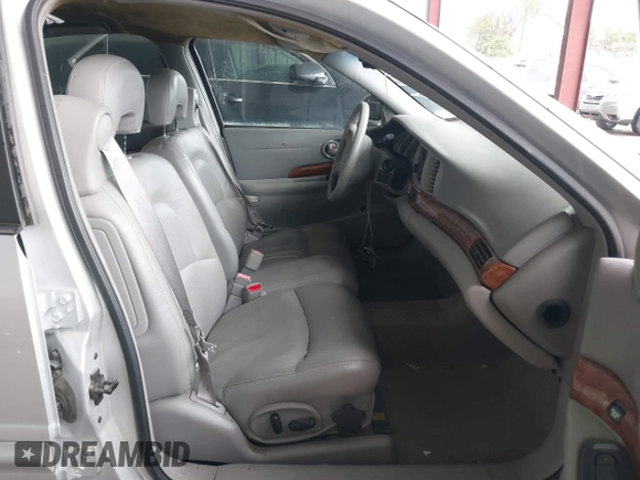 2003 Buick LeSabre Limited z VIN 1G4HR54K13U209094, wystawiony jako IAAI lot #42572460 z przebiegiem 102 970 mil mil oraz . Historia ofert i sprzedaży dostępna na DreamBid. Obrazek 5.