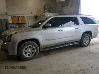 2015 GMC Yukon XL SLT z VIN 1GKS2HKC3FR686150, wystawiony jako Copart lot #55035025 z przebiegiem 272 994 mil mil oraz Czysty tytuł • Clean title. Historia ofert i sprzedaży dostępna na DreamBid. Obrazek 1.