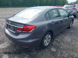 2015 Honda Civic LX with VIN 19XFB2F59FE065190, listed as a IAAI auction lot 42070979 with 153,317 mi miles and . Bid and sale history available at DreamBid. Image 4.