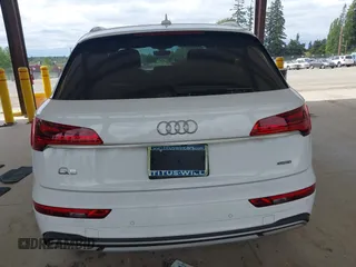 2021 Audi Q5 Premium Plus z VIN WA1BAAFY5M2004171, wystawiony jako IAAI lot #42140899 z przebiegiem 62 544 mil mil oraz . Historia ofert i sprzedaży dostępna na DreamBid. Obrazek 17.