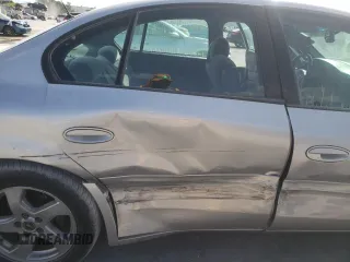 2003 Pontiac Bonneville SLE z VIN 1G2HY54K334173324, wystawiony jako Copart lot #78175394 z przebiegiem 130 829 mil mil oraz Szkoda całkowita • Salvage title. Historia ofert i sprzedaży dostępna na DreamBid. Obrazek 10.