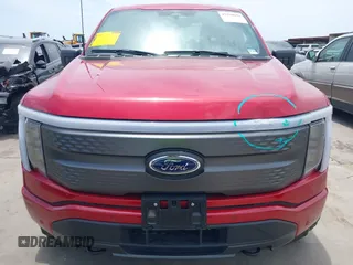 2023 Ford F-150 Lightning Pro with VIN 1FTVW1EL8PWG33656, listed as a IAAI auction lot 42260659 with 22,490 mi miles and . Bid and sale history available at DreamBid. Image 12.