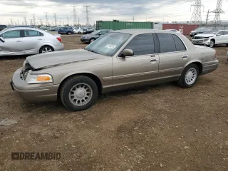 2002 Ford Crown Victoria LX z VIN 2FAFP74W32X146559, wystawiony jako Copart lot #54144615 z przebiegiem 113 589 mil mil oraz Szkody całkowita. Historia ofert i sprzedaży dostępna na DreamBid. Obrazek 1.
