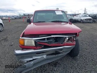 1994 Ford Ranger with VIN 1FTCR14A0RPC45056, listed as a IAAI auction lot 41885553 with 205,761 mi miles and . Bid and sale history available at DreamBid. Image 12.