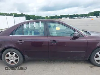 2006 Hyundai Sonata GLS z VIN 5NPEU46F06H095040, wystawiony jako IAAI lot #42530027 z przebiegiem 166 268 mil mil oraz . Historia ofert i sprzedaży dostępna na DreamBid. Obrazek 13.