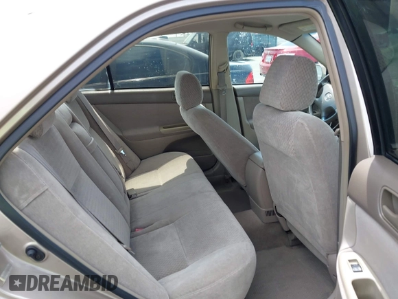2002 Toyota Camry LE z VIN 4T1BE32K72U078387, wystawiony jako IAAI lot #42052328 z przebiegiem 157 394 mil mil oraz . Historia ofert i sprzedaży dostępna na DreamBid. Obrazek 8.