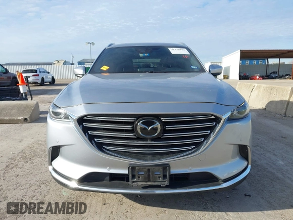 2020 Mazda CX-9 Grand Touring z VIN JM3TCADY7L0416696, wystawiony jako IAAI lot #41310183 z przebiegiem 105 754 mil mil oraz . Historia ofert i sprzedaży dostępna na DreamBid. Obrazek 12.
