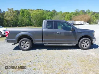 2019 Ford F-150 XL z VIN 1FTEX1C51KFA73506, wystawiony jako IAAI lot #42065274 z przebiegiem 144 397 mil mil oraz . Historia ofert i sprzedaży dostępna na DreamBid. Obrazek 14.