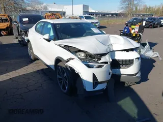 2022 Polestar 2 z VIN LPSED3KA6NL075642, wystawiony jako IAAI lot #41446889 z przebiegiem Nie podano mil oraz . Historia ofert i sprzedaży dostępna na DreamBid. Obrazek 1.