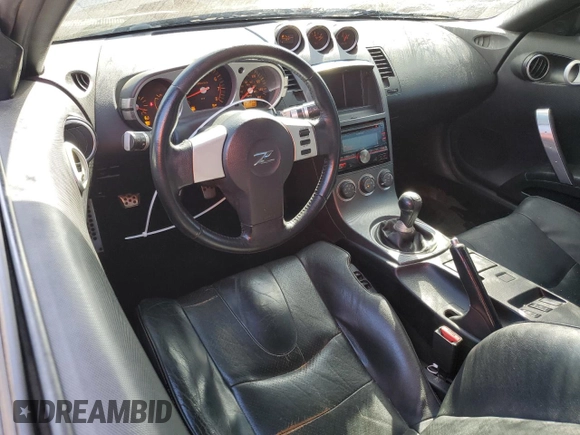 2003 Nissan 350Z Touring z VIN JN1AZ34E73T016672, wystawiony jako Copart lot #52968375 z przebiegiem 125 844 mil mil oraz Szkoda całkowita • Salvage title. Historia ofert i sprzedaży dostępna na DreamBid. Obrazek 8.
