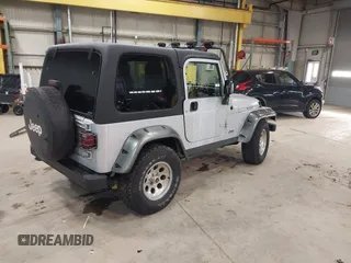 2003 Jeep Wrangler Rubicon with VIN 1J4FA69S13P375142, listed as a IAAI auction lot 41709647 with 125,443 mi miles and . Bid and sale history available at DreamBid. Image 4.