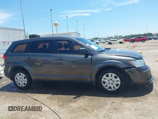 2015 Dodge Journey American Value z VIN 3C4PDCAB2FT637391, wystawiony jako IAAI lot #42354094 z przebiegiem 130 743 mil mil oraz . Historia ofert i sprzedaży dostępna na DreamBid. Obrazek 13.