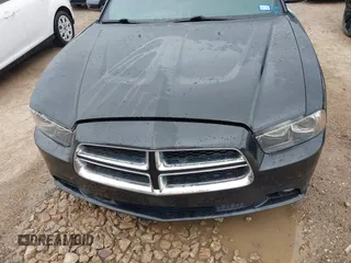 2014 Dodge Charger RT with VIN 2C3CDXCT4EH340887, listed as a IAAI auction lot 42113933 with 143,897 mi miles. Bid and sale history available at carsss.com. Image 12.