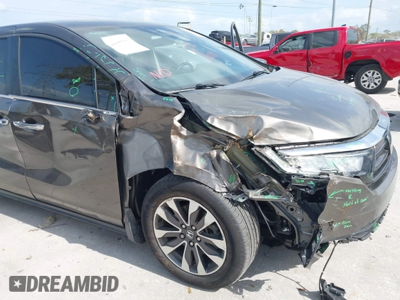 2022 Honda Odyssey EX-L with VIN 5FNRL6H77NB031502, listed as a IAAI auction lot 41706098 with 57,074 mi miles and . Bid and sale history available at DreamBid. Image 6.