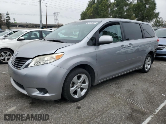2012 Toyota Sienna with VIN 5TDKA3DC4CS014867, listed as a Copart auction lot 43191655 with 169,517 mi miles and Salvage Title. Bid and sale history available at DreamBid. Image 1.