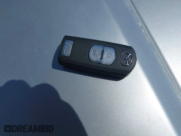 2019 Mazda CX-5 Sport with VIN JM3KFABM7K1509987, listed as a IAAI auction lot 42062804 with 50,898 mi miles and . Bid and sale history available at DreamBid. Image 11.