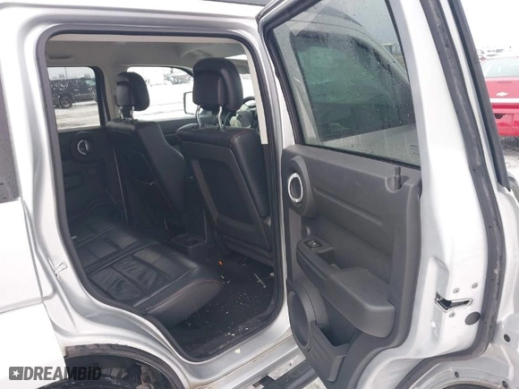 2011 Dodge Nitro Heat with VIN 1D4PU4GX1BW607458, listed as a IAAI auction lot 41279270 with 90,969 mi miles. Bid and sale history available at carsss.com. Image 8.