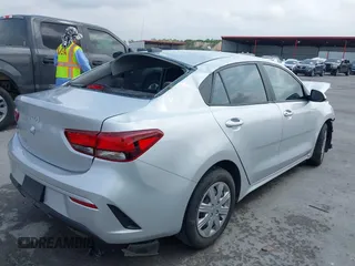 2023 Kia Rio S z VIN 3KPA24AD8PE530662, wystawiony jako IAAI lot #42109727 z przebiegiem 34 948 mil mil oraz . Historia ofert i sprzedaży dostępna na DreamBid. Obrazek 4.