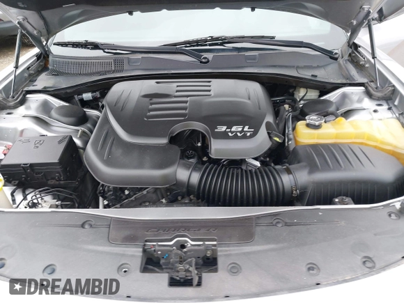 2015 Dodge Charger SXT with VIN 2C3CDXHG1FH886088, listed as a IAAI auction lot 42331369 with 119,659 mi miles and . Bid and sale history available at DreamBid. Image 10.