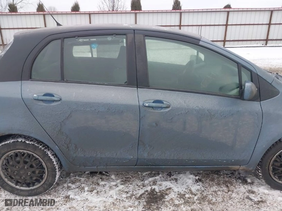 2010 Toyota Yaris with VIN JTDKT4K30A5321944, listed as a IAAI auction lot 41505259 with 140,929 mi miles. Bid and sale history available at carsss.com. Image 13.