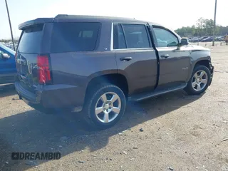 2016 Chevrolet Tahoe LT z VIN 1GNSCBKC3GR238392, wystawiony jako IAAI lot #41443009 z przebiegiem 95 163 mil mil oraz . Historia ofert i sprzedaży dostępna na DreamBid. Obrazek 4.