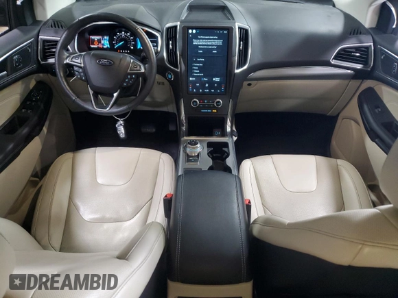 2021 Ford Edge Titanium with VIN 2FMPK4K96MBA38750, listed as a Copart auction lot 61401615 with 34,778 mi miles and Salvage title. Bid and sale history available at DreamBid. Image 8.
