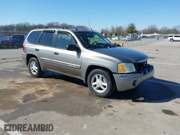 2005 GMC Envoy SLE z VIN 1GKDT13S252331044, wystawiony jako IAAI lot #41749219 z przebiegiem 263 876 mil mil oraz . Historia ofert i sprzedaży dostępna na DreamBid. Obrazek 1.