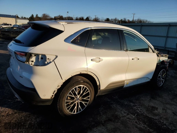2022 Ford Escape Titanium Plug-In Hybrid с VIN 1FMCU0LZ5NUA57513, выставлен на аукционе Copart как лот 41634475 с пробегом 52 542 миль миль и Списание • Salvage title. История ставок и продаж доступна на DreamBid. Изображение 3.