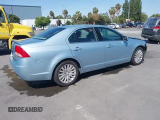 2010 Mercury Milan Hybrid with VIN 3MEDM0L35AR641477, listed as a IAAI auction lot 42443628 with 102,890 mi miles and . Bid and sale history available at DreamBid. Image 4.