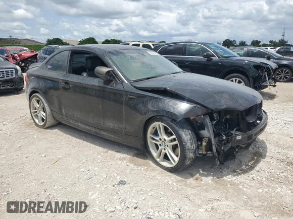 2012 BMW 1 Series 135i with VIN WBAUC9C5XCVM12807, listed as a Copart auction lot 61680225 with 117,314 mi miles and Salvage title. Bid and sale history available at DreamBid. Image 4.