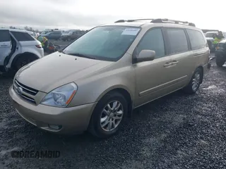 2007 Kia Sedona EX with VIN KNDMB233676121720, listed as a IAAI auction lot 41606082 with 200,736 mi miles. Bid and sale history available at carsss.com. Image 2.