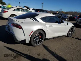 2021 Toyota Supra 3.0 с VIN WZ1DB0C02MW042827, выставлен на аукционе Copart как лот 81323404 с пробегом 35 466 миль миль и Списание • Salvage title. История ставок и продаж доступна на DreamBid. Изображение 3.
