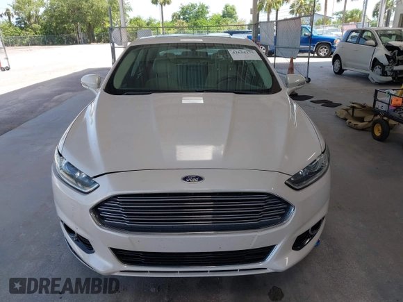 2016 Ford Fusion Titanium with VIN 3FA6P0K96GR390989, listed as a IAAI auction lot 42634275 with 123,559 mi miles and . Bid and sale history available at DreamBid. Image 12.
