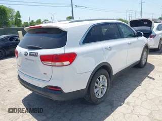 2016 Kia Sorento LX with VIN 5XYPG4A3XGG028712, listed as a IAAI auction lot 42013222 with 112,736 mi miles. Bid and sale history available at carsss.com. Image 4.