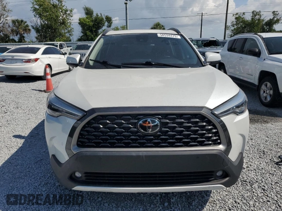 2022 Toyota Corolla Cross XLE с VIN 7MUDAAAG1NV023474, выставлен на аукционе Copart как лот 58534475 с пробегом 7 125 миль миль и Списание • Salvage title. История ставок и продаж доступна на DreamBid. Изображение 5.