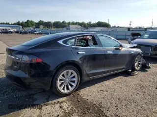 2018 Tesla Model S 75D with VIN 5YJSA1E21JF284845, listed as a Copart auction lot 62549885 with Not provided miles and Clean title. Bid and sale history available at DreamBid. Image 3.
