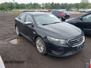 2014 Ford Taurus Limited z VIN 1FAHP2J8XEG112310, wystawiony jako IAAI lot #42367397 z przebiegiem 77 329 mil mil oraz . Historia ofert i sprzedaży dostępna na DreamBid. Obrazek 1.
