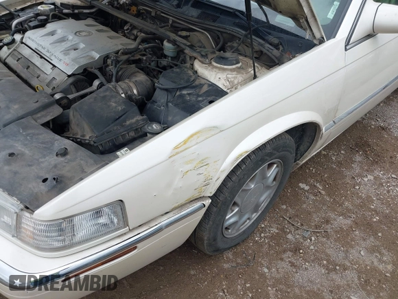 2002 Cadillac Eldorado ESC with VIN 1G6EL12Y92B100940, listed as a IAAI auction lot 42094683 with 146,859 mi miles. Bid and sale history available at carsss.com. Image 13.
