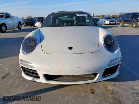 2011 Porsche 911 Carrera S z VIN WP0CB2A91BS754113, wystawiony jako Copart lot #46034565 z przebiegiem Nie podano mil oraz Szkoda całkowita • Salvage title. Historia ofert i sprzedaży dostępna na DreamBid. Obrazek 5.